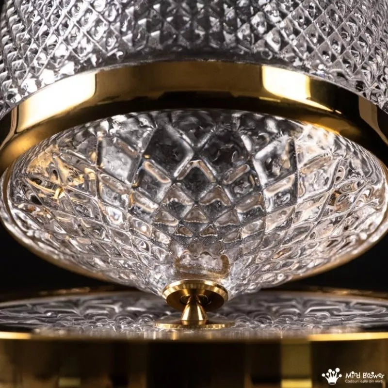 Złota karafka obrotowa do alkoholu